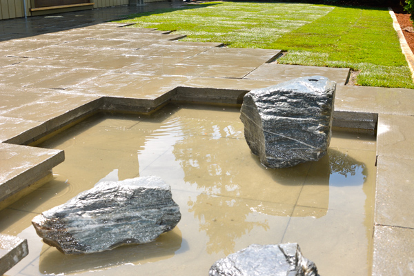 stone-water-feature-patio-brick